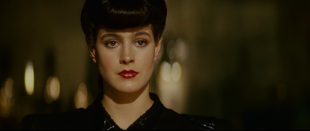 A still of the character Rachel, from the 1982 movie "Blade Runner" by Ridley Scott. Rachel is a replicant, a form of cyborg from the Blade Runner universe.